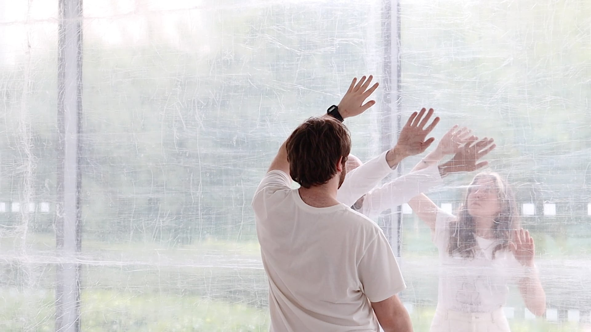 Cos Ahmet, A Meniscus Between, 2021 - Still from digital video. Performers, choreographic object, clear tape.